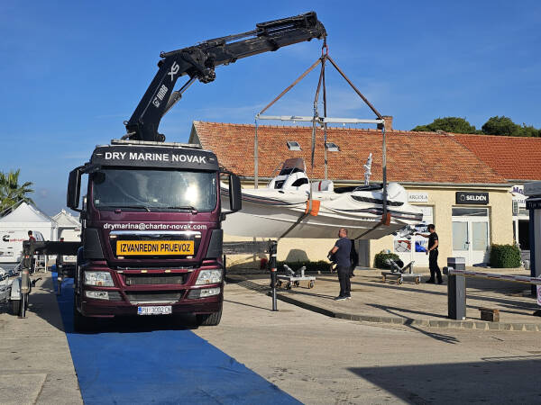 How International vessel road transport really works?